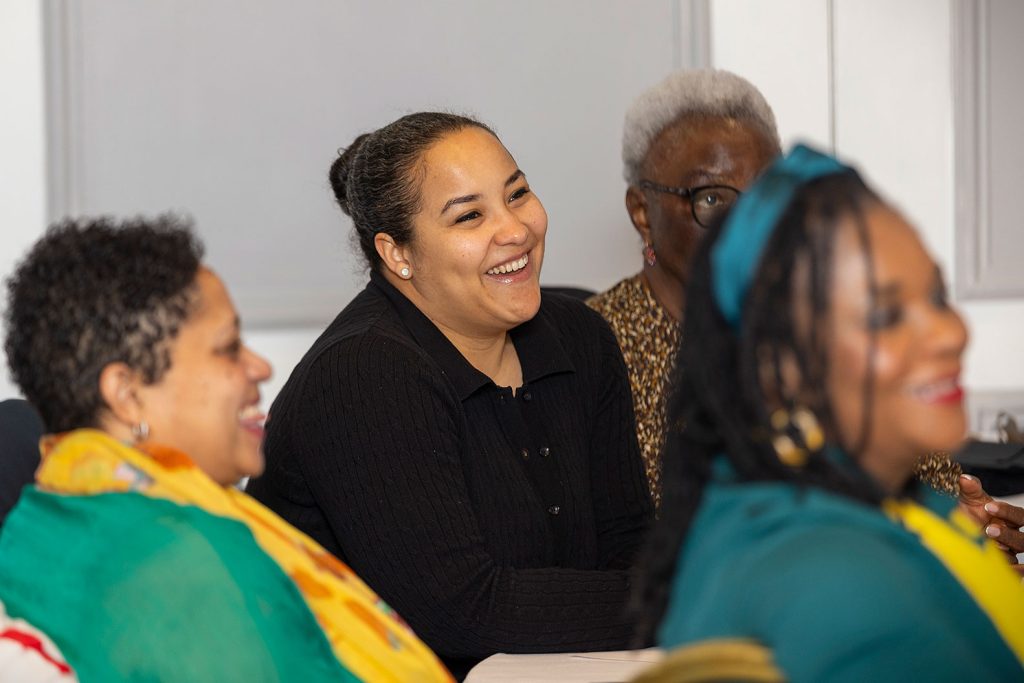 womens support in scotland a woman laughing during an adelphe connect event